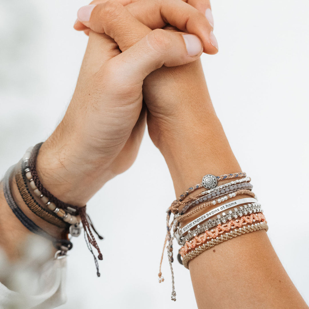 Cambio global - Brazalete de plata .925